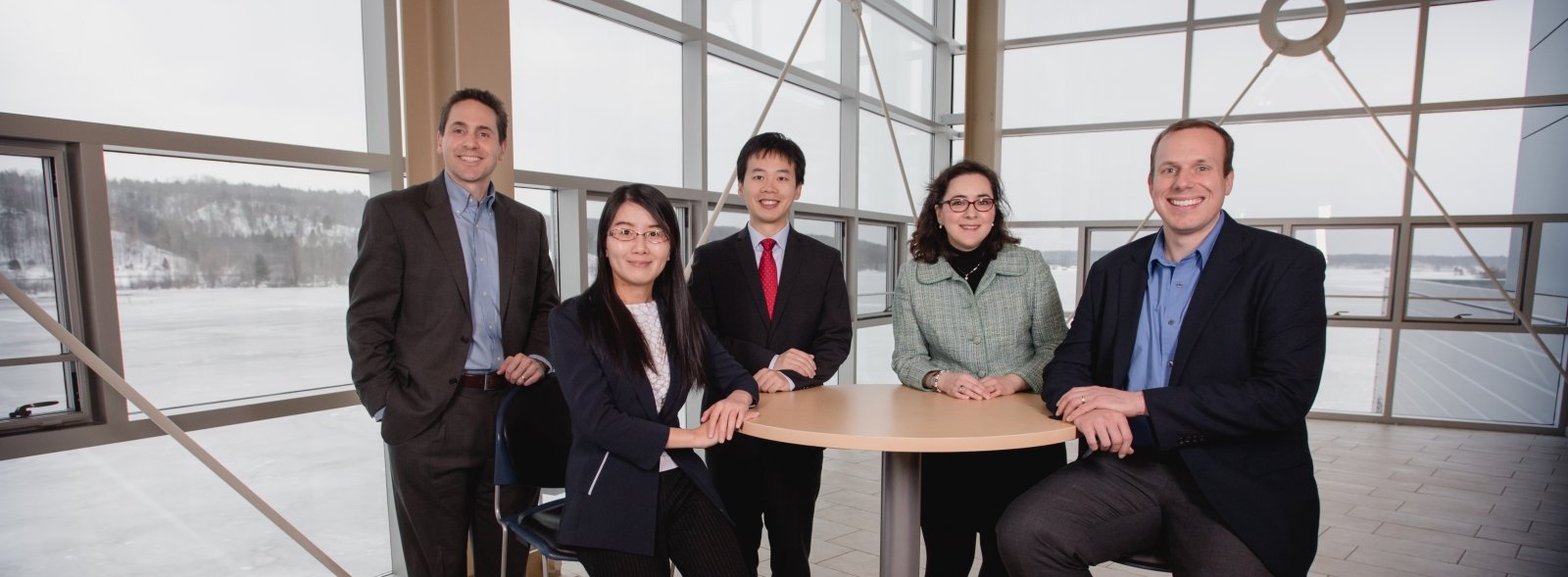 Michigan Tech's award winning researchers Jason Carter, Zhaohui Wang, Xiaohu Xia, Lucia Gauchia, and Stephen Techtmann.