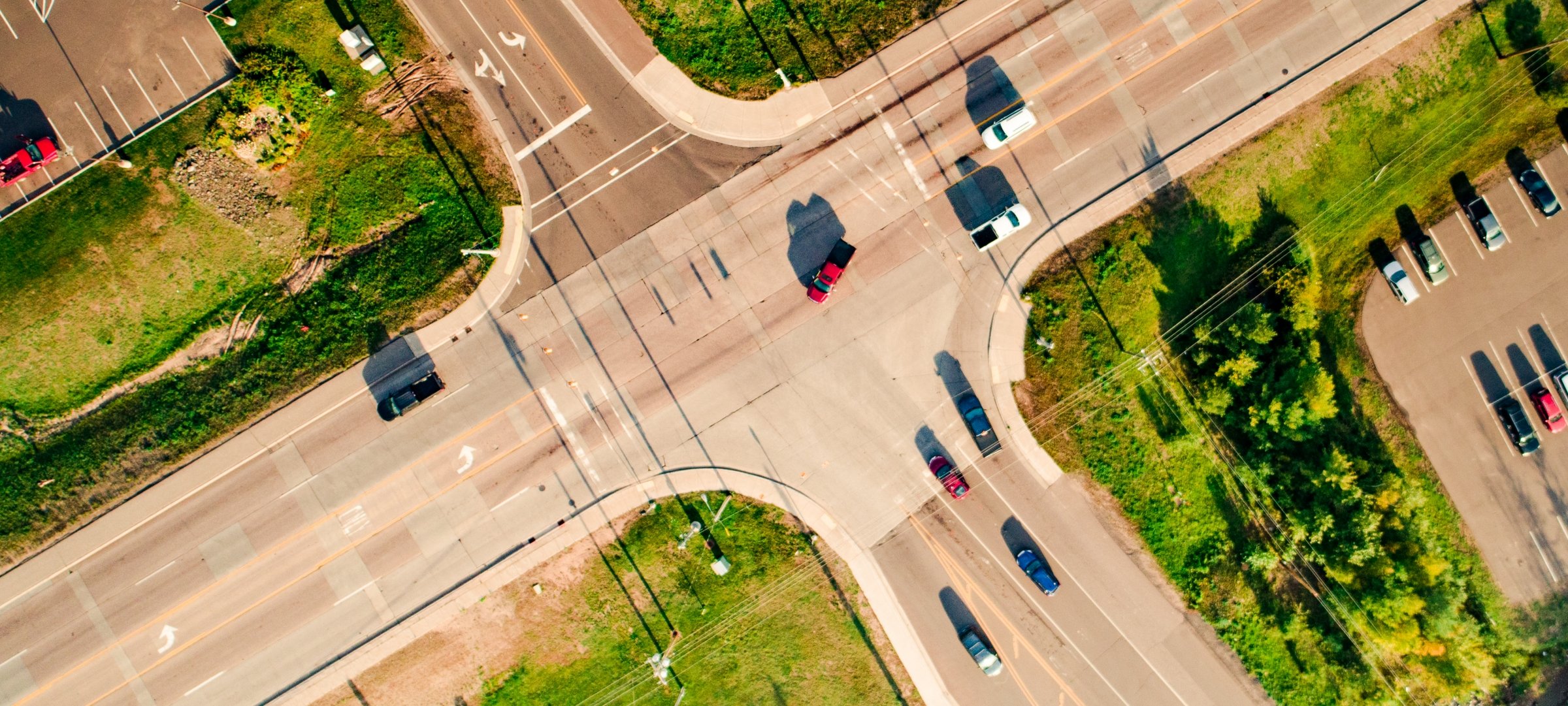 Aerial view of cars at an intersection.