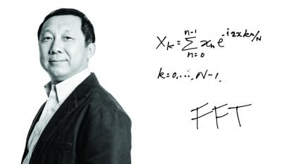 Jiguang Sun next to handwritten math equations.