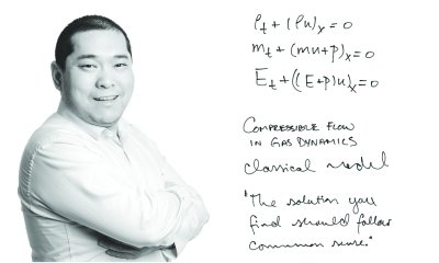 Yang Yang next to handwritten math equations.