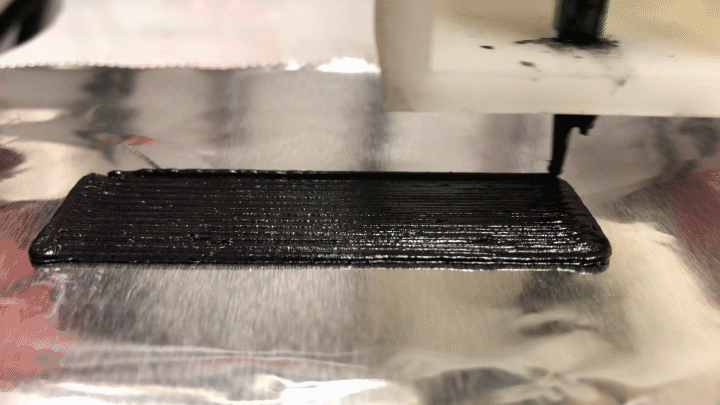 Animated gif of a 3-D printer printing.