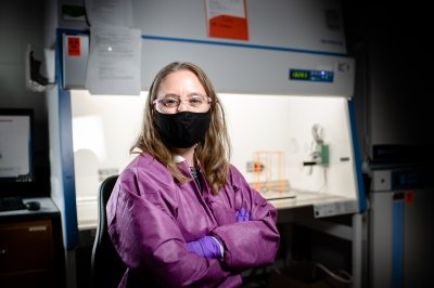 Caryn Heldt wearing a face covering in the lab.
