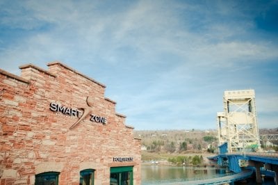 SmartZone building next to the Keweenaw Waterway and Portage Lake Lift Bridge.