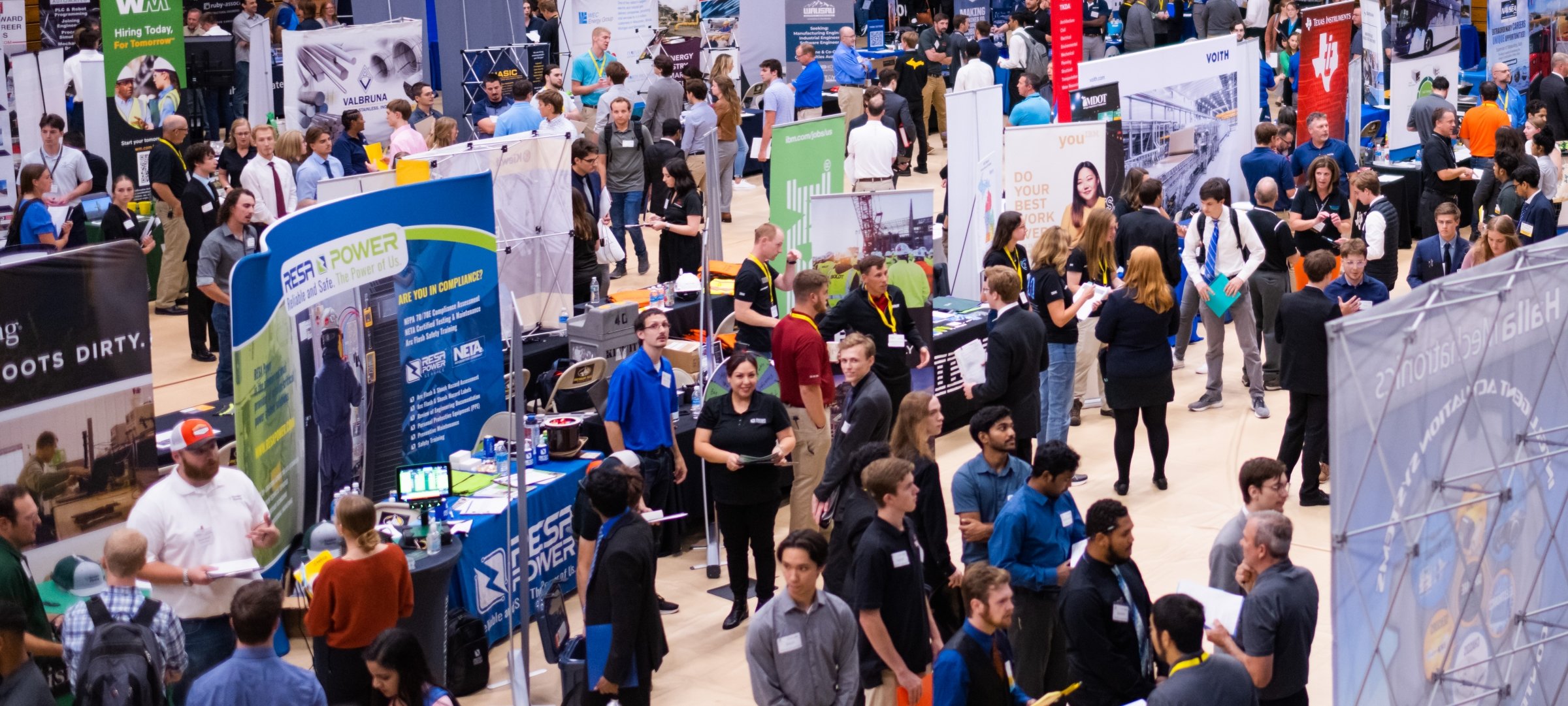 Student talking to a Ford recruiter at Career Fair