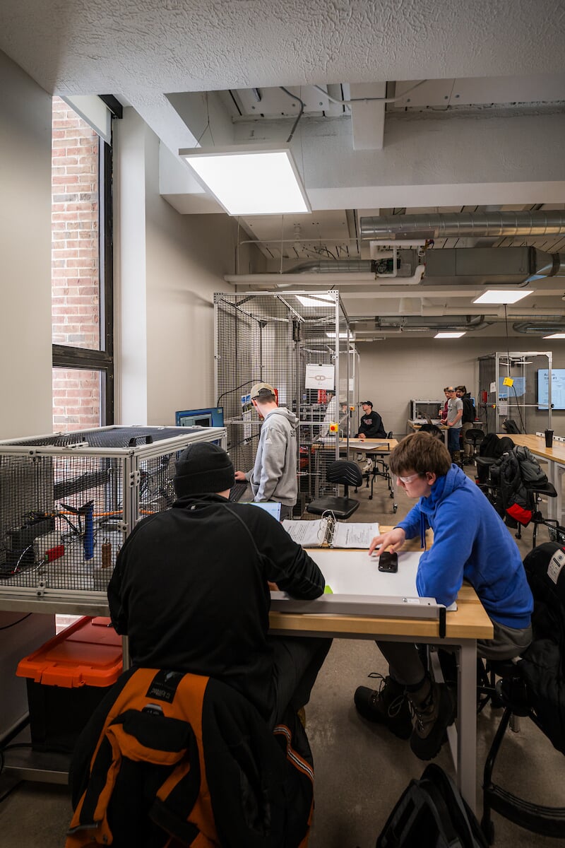 Aerospace students working in a lab