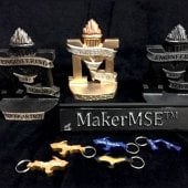 Student Metal Cast bookends and U.P. keychains