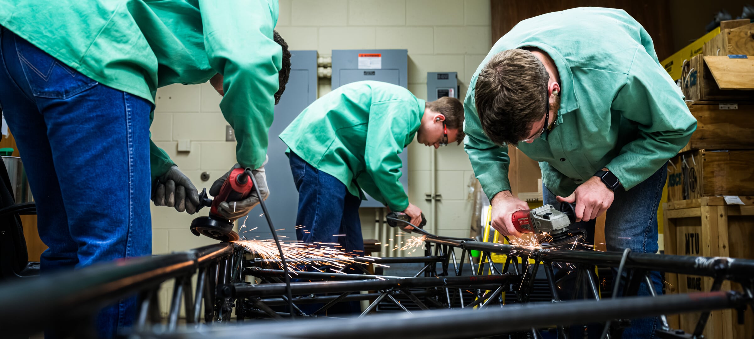Students working on steel bridge