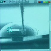 Box on upper edge in window.