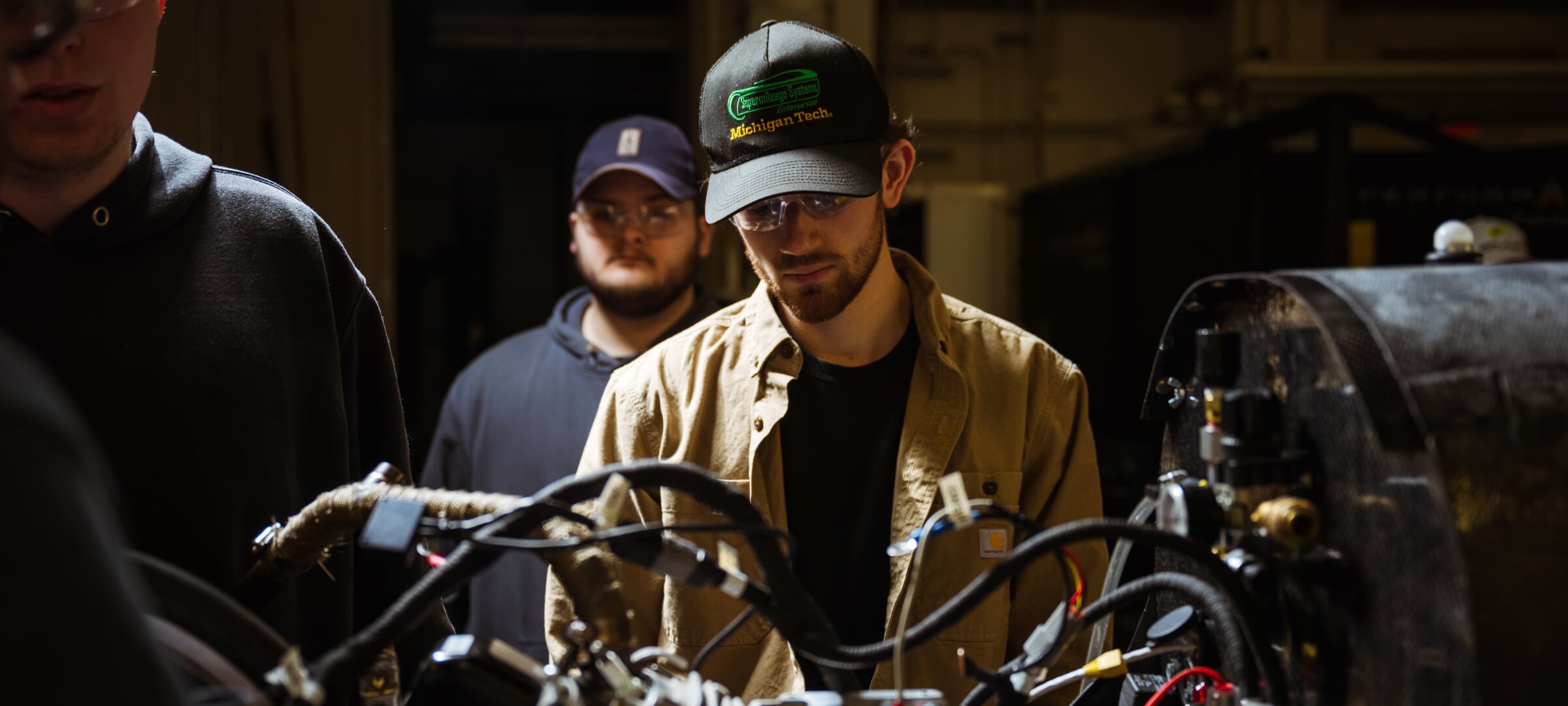 Students looking at a motor