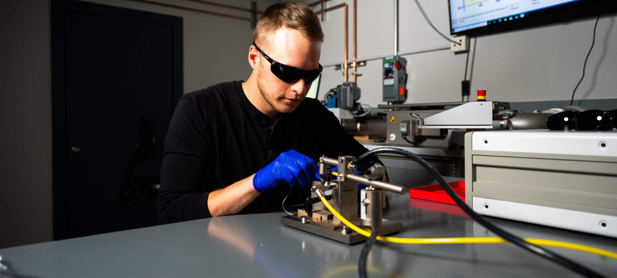 A student working in the Dynamic Physical Metallurgy Lab at Michigan Tech