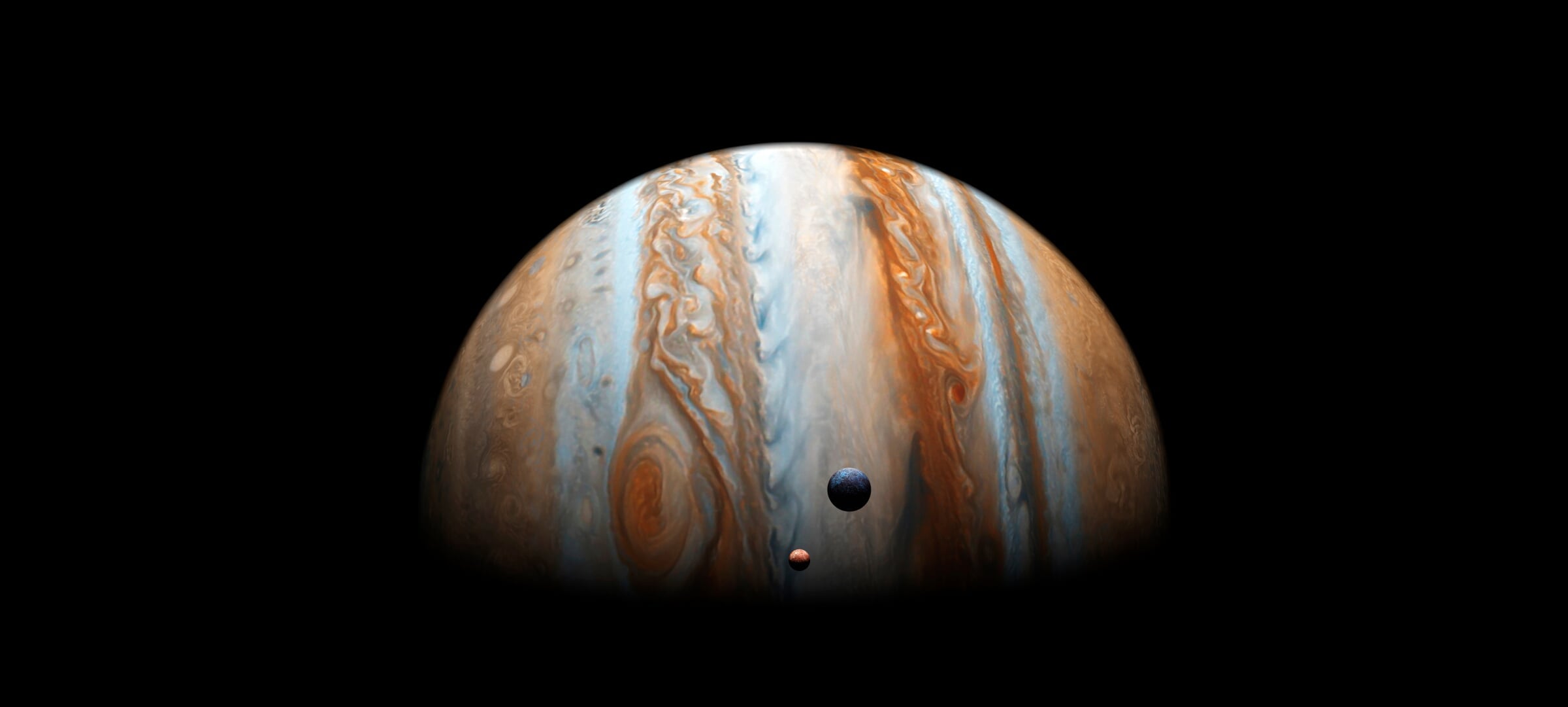Two moons orbiting Jupiter.
