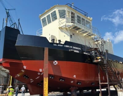 Large board out of hte water with U.S. Army Corps of Engineering written on the side.