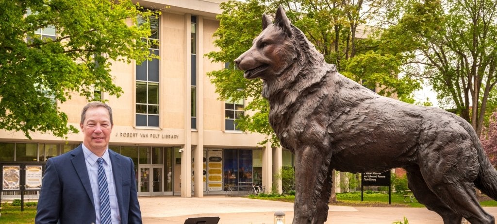 Jason Blough near the Husky statue on campus.