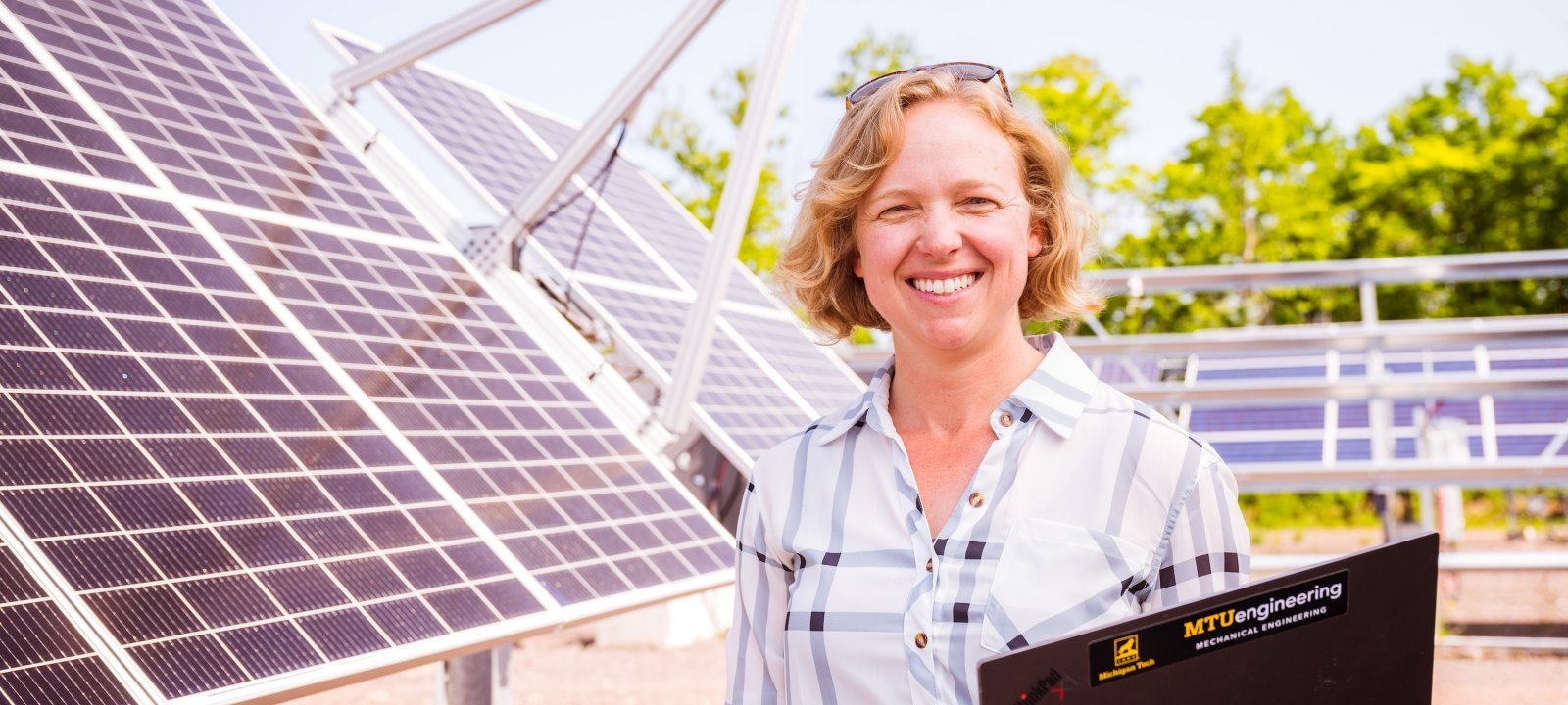 Ana Dyreson doing field research with solar power.