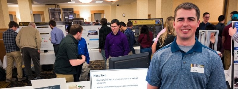 Senior Design Poster with Student and Design Expo Participants