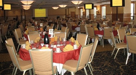 Memorial Union ballroom with tables set for dinner