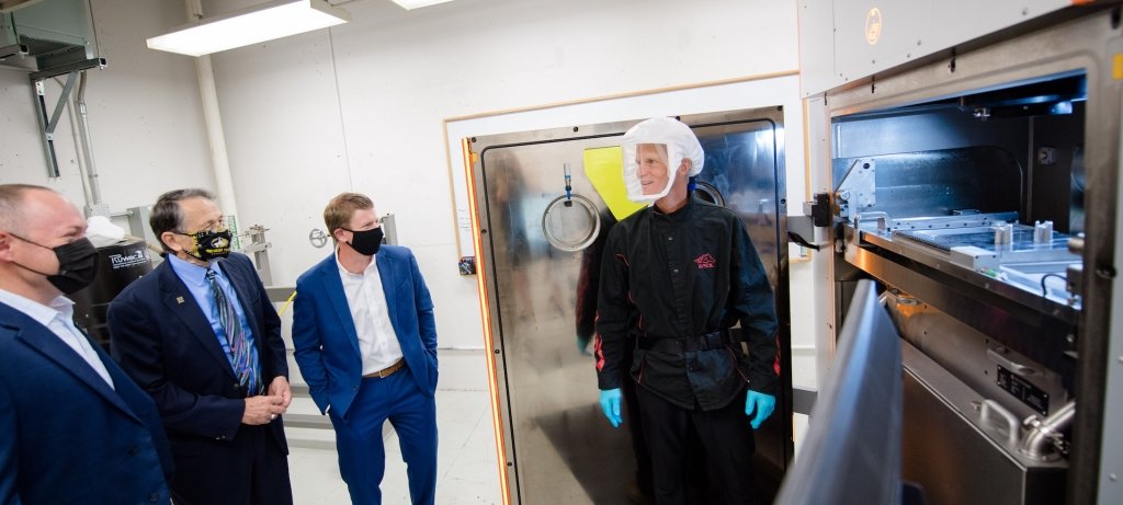 People visiting the advanced metal 3d printing center.