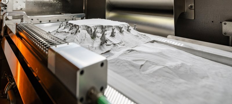 Array of metal objects in the 3D printer.