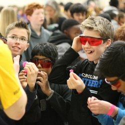  STudents at a table at the festival.