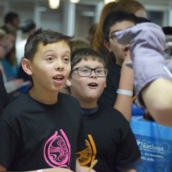 Students watching a demonstration.