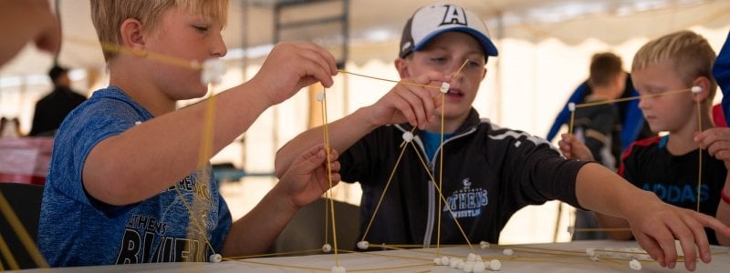 Students trying an experiment.
