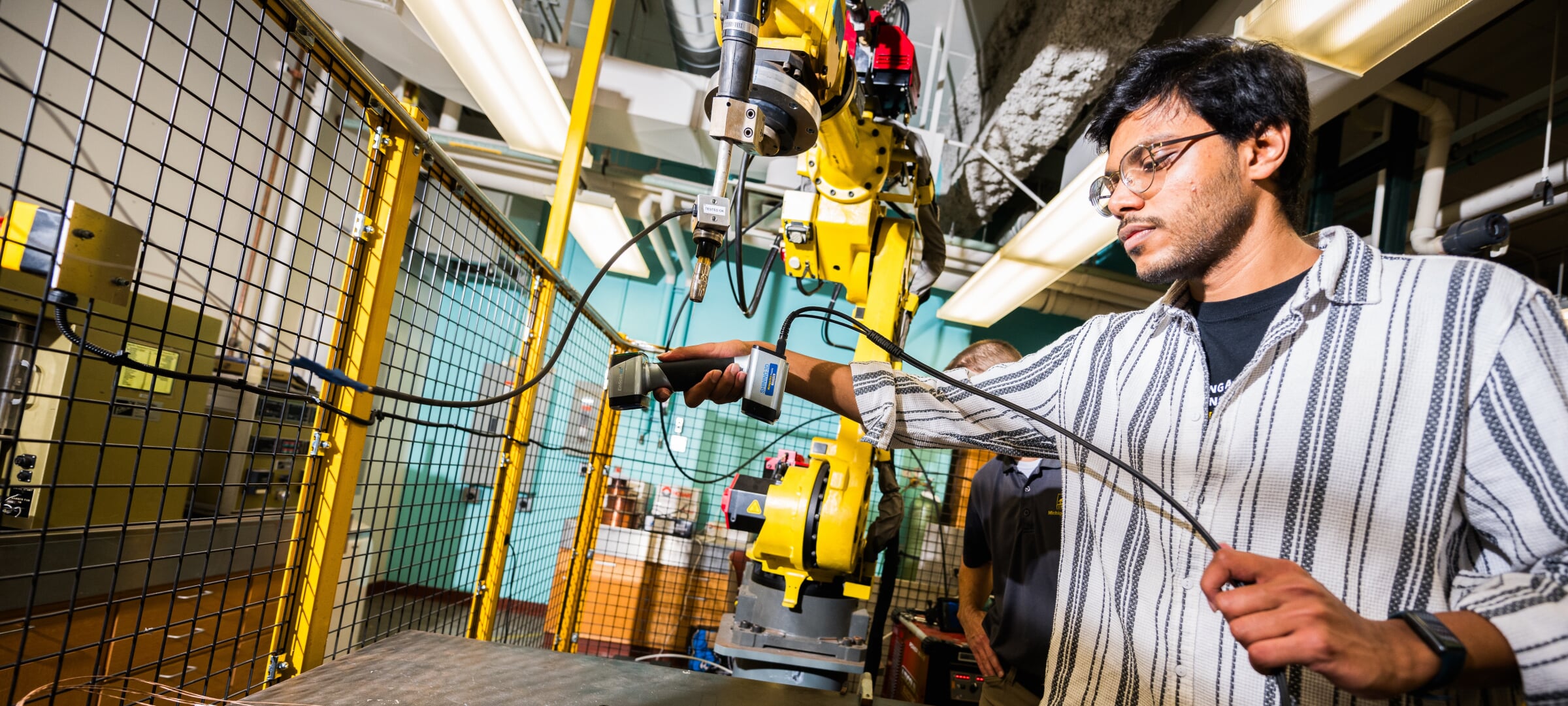 Student working in the robotics and mechatronics lab.