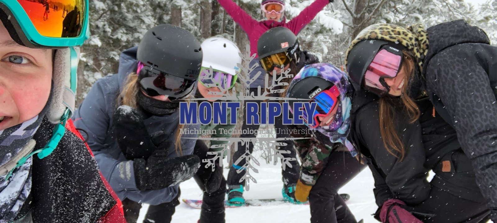 Instructor teaching a snowboarding PE class.