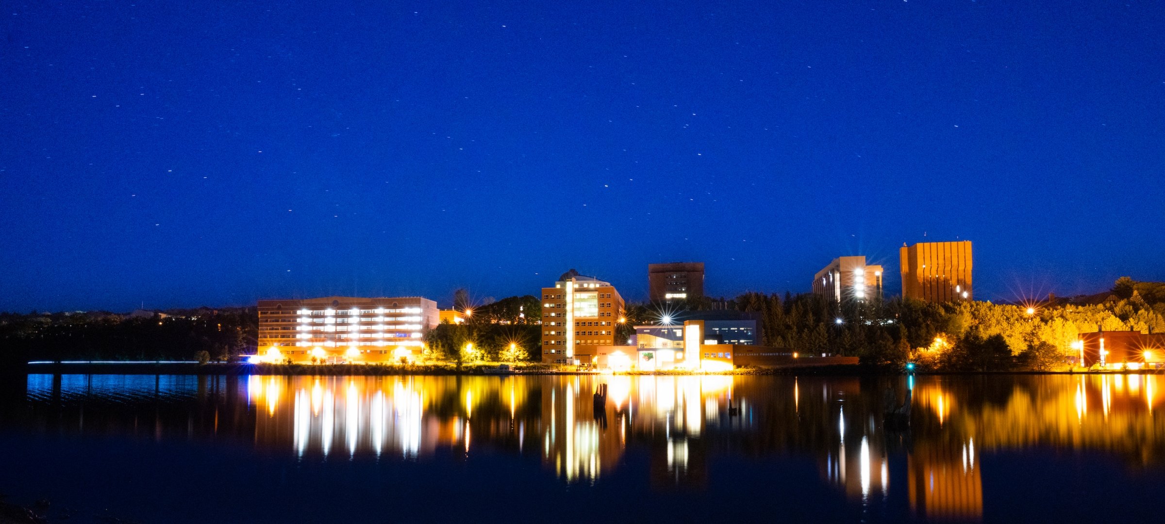 Michigan Tech campus at night from the Portage Canal.