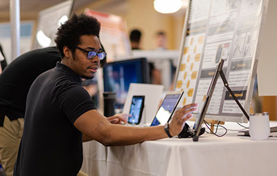 A student looking at a presentation