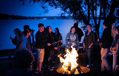 Students at a bonfire