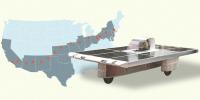 The solar car in front of a US map highlighting the route from New York to California.