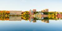 Campus reflection on the Keweenaw Waterway in fall