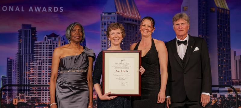 2025 James Bryant Conant Award recipient Amiee Modic '84 is presented her award by ACS President Dorothy J. Phillips (First Left), and sponsor representatives from the Journal of Chemical Education and ChemEd X.