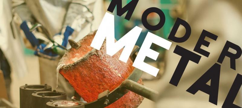 Molten metal being poured into molds.