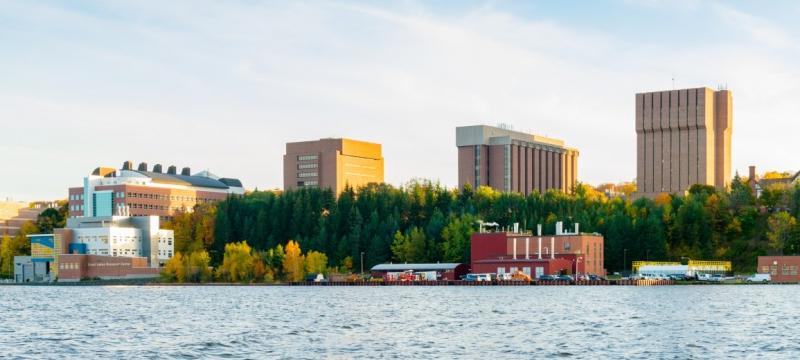 A view of campus from across the waterway.