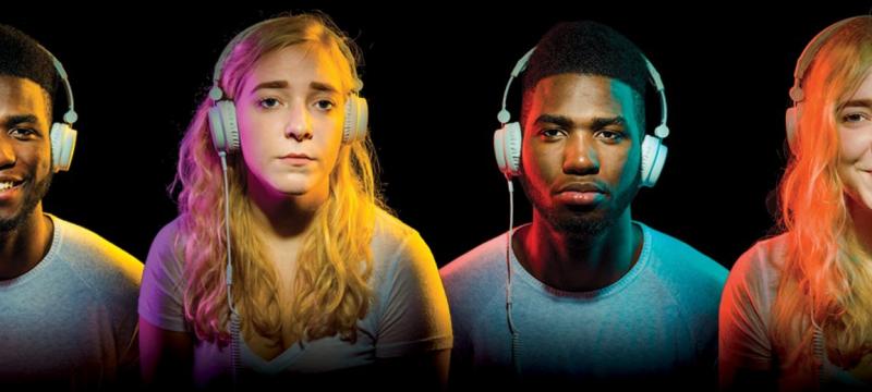 Students wearing headphones.
