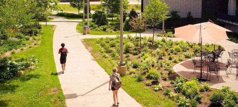 Students walking on campus.