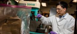 A researcher works in a Michigan Tech lab that is perfecting battery recycling technologies.