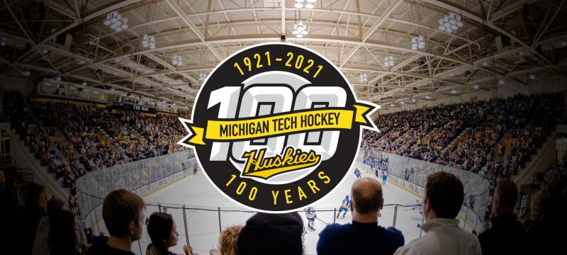 1921-2021 Michigan Tech Hockey 100 Years logo over  a background of the MacInnes Ice Arena.