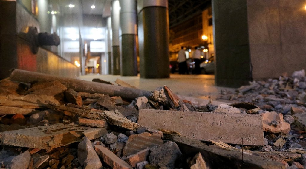 Rubble piles up in a parking garage from the recent 7.8-magnitude earthquake in Ecuador; recent graduate Luke Bowman is down helping communities respond to the disaster. Credit: Agencia Andes, Cesar Mu