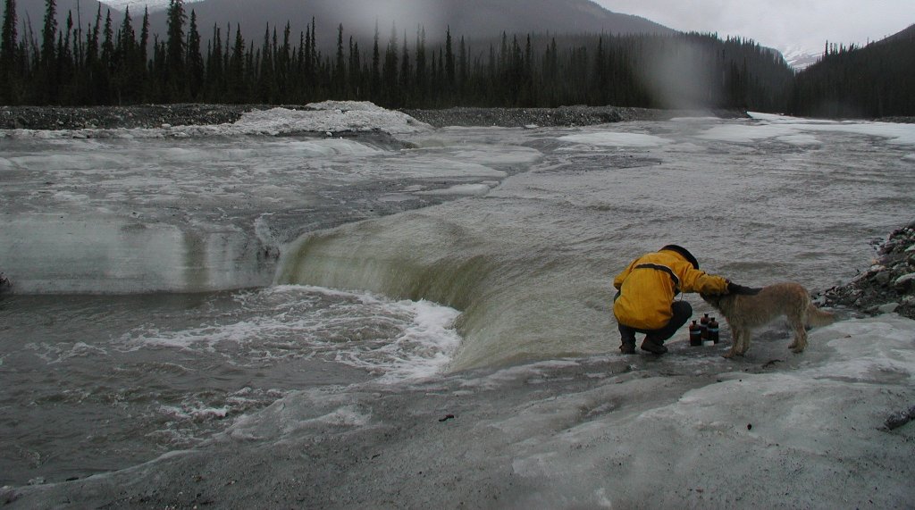 To better understand the impact of methane and carbon dioxide on climate change, ecologist Evan Kane samples thawing permafrost in Alaska.