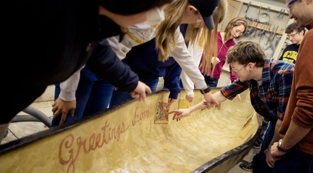 Engineering students put their education to work building concrete canoes for an annual race.