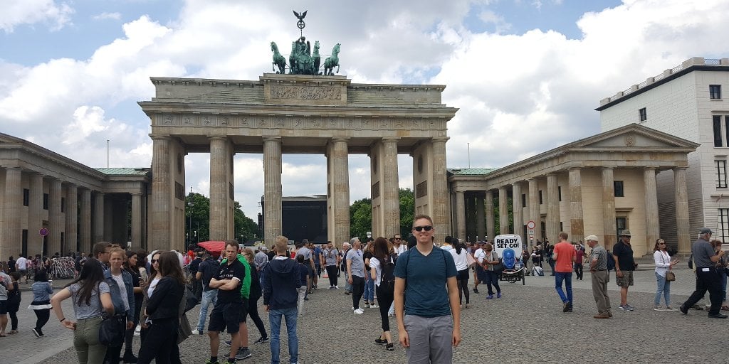 Ethan Klein in front of the Brandenburg Gate.