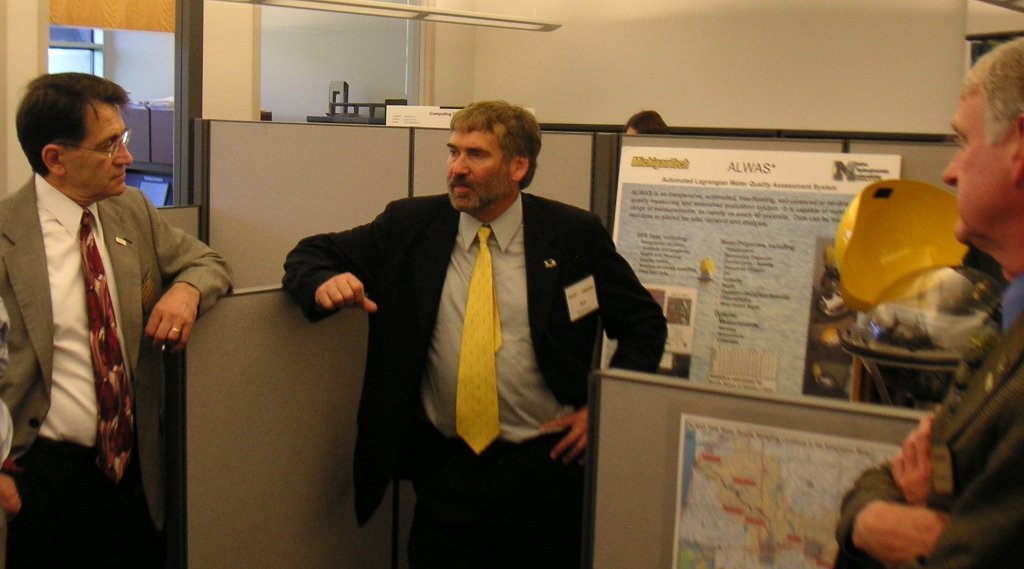 MTRI Co-Director Bob Shuchman (center) explains some of the institute's research to Bill Predebon (left), chair of mechanical engineering-engineering mechanics at Michigan Tech, and Silicon Valley executive Dave House, whose gift helped found MTRI.