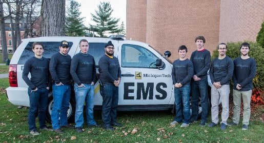 Student EMS volunteers who helped during Mark Calabria's heart attack. From the left: Theodore Kretzmann, Mike Sommers, Kyle Huyser, Ramandeep Rekhi, Ross Michaels,Jesse Olson, Mario Calabria, Jackson Burek.