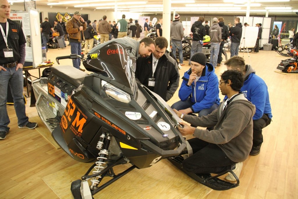 The student teams start off with standard modern sleds and then take apart, modify and build a sled with reduced emissions and noise.