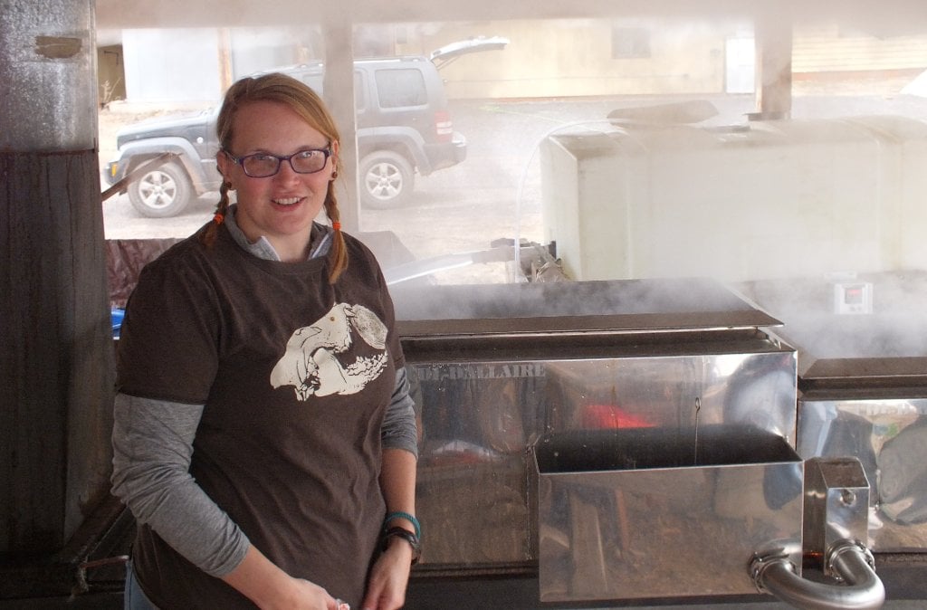 Tara Bal with the wood-fired evaporator used to bring the sap to its optimal boiling temperature.