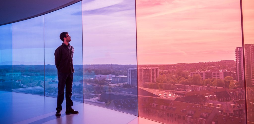Learning to do interdisciplinary, international research takes students to Denmark this summer, where they'll get new views on collaborative research in the lab and from the colored-glass walkway at the Aros Art Museum. Credit: Taran Schatz