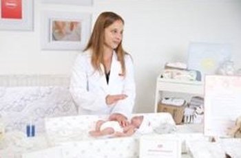 Angela Johnston tests the preemie diaper she developed.