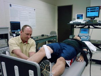 Cooke uses neurological tests to study how blood flow to and from the brain is affected by activity.